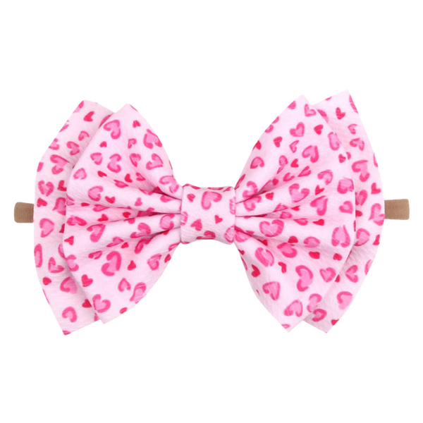 PINK LEOPARD PRINT HEART BOW