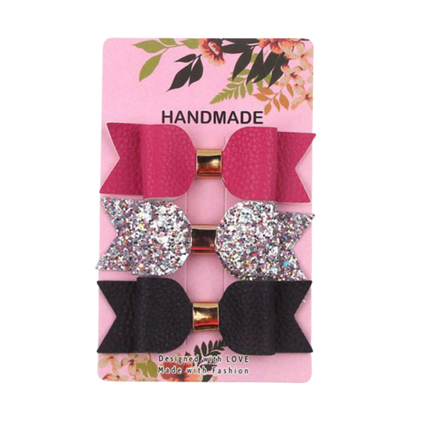 PINK, BLACK & GLITTER FAUX LEATHER BOW CLIPS